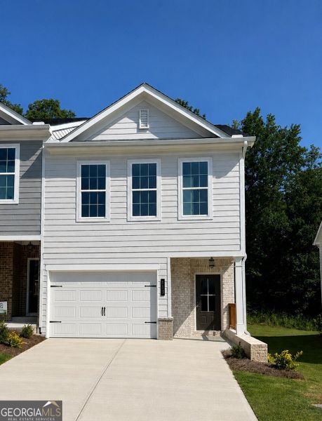 Front exterior of a new home in Chimney Oaks Townhomes, Homer, GA, highlighting curb appeal (Image 1). Front exterior of a new home in Chimney Oaks Townhomes, Homer, GA, highlighting curb appeal (Image 1).