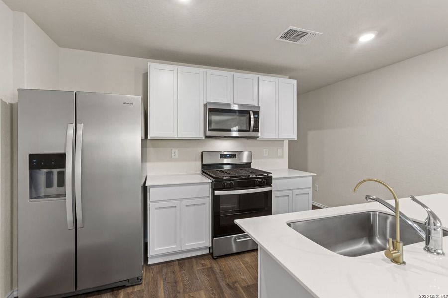 Furnished interior view inside a new home in Redbird Ranch, San Antonio (Image 5).