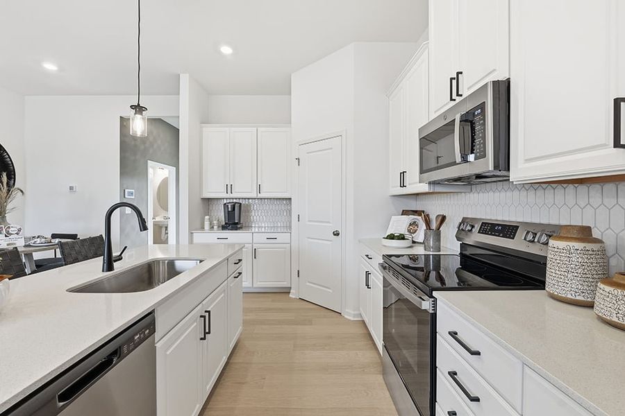 Furnished interior view inside a new home in Terraces at the Exchange, Indian Land (Image 6).