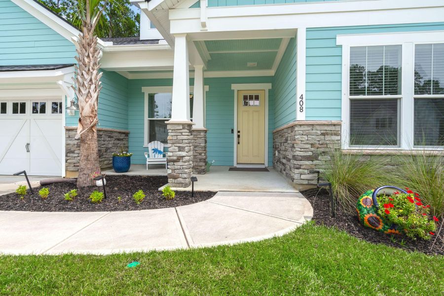 Front exterior of a new home in , Huger, SC, highlighting curb appeal (Image 2).