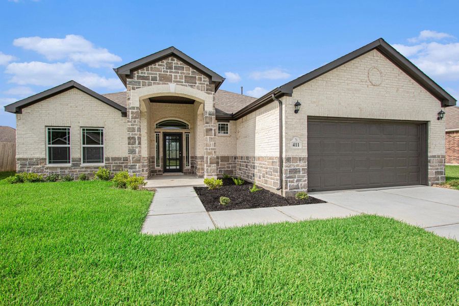 Front exterior of a new home in Columbia Lakes, West Columbia, TX, highlighting curb appeal (Image 17). Front exterior of a new home in Columbia Lakes, West Columbia, TX, highlighting curb appeal (Image 17).