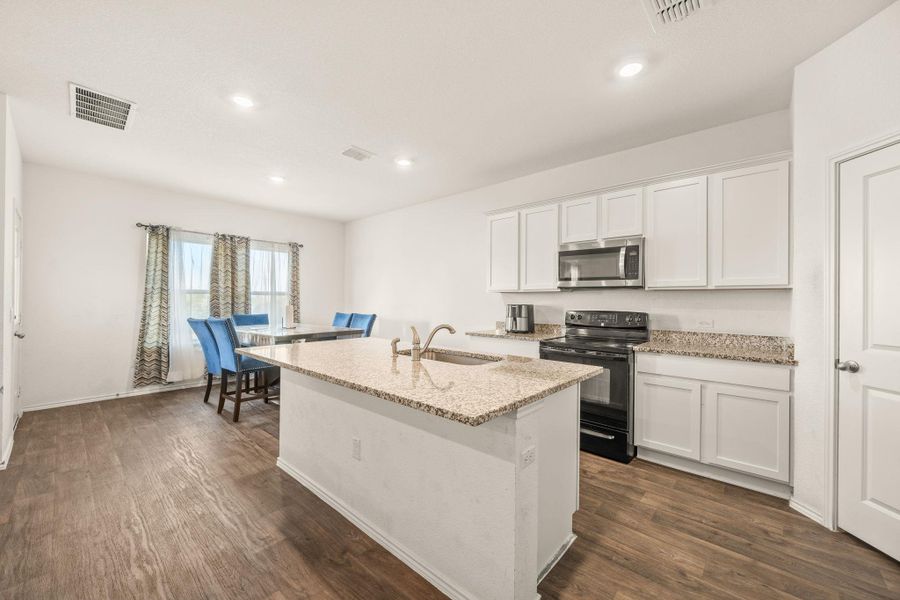 Furnished interior view inside a new home in Palomino, Manor (Image 10). Furnished interior view inside a new home in Palomino, Manor (Image 10).