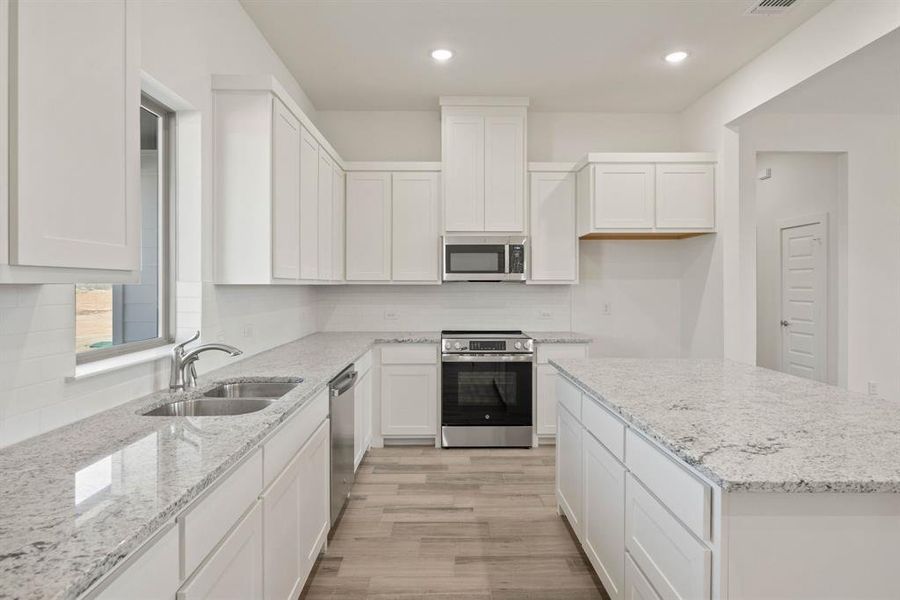 Furnished interior view inside a new home in Saddleback Estates, Boyd (Image 7).