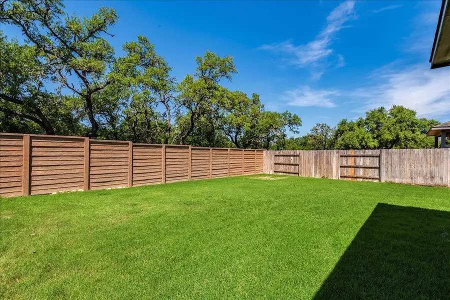 Exterior details and patio area of a home in , Kyle (Image 3).