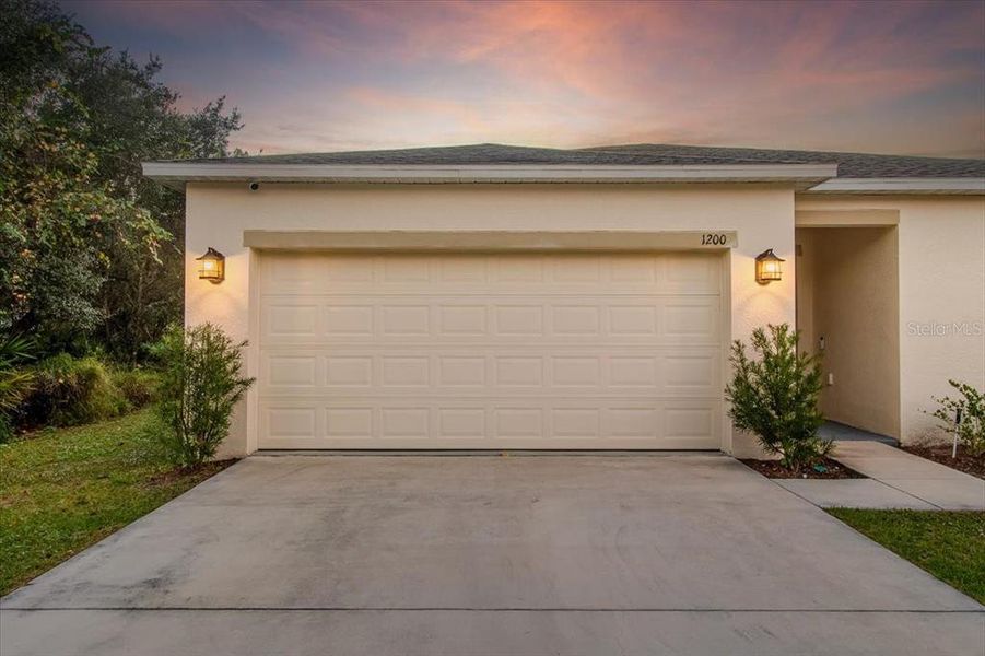 Front exterior of a new home in Poinciana, Poinciana, FL, highlighting curb appeal (Image 20).