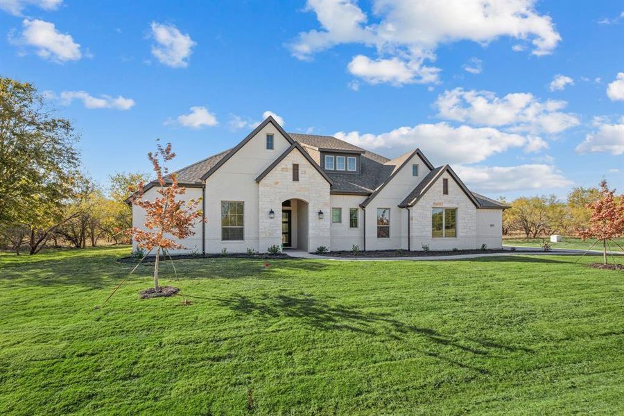 Front exterior of a new home in Rolling Creek Ranch, Aledo, TX, highlighting curb appeal (Image 27).