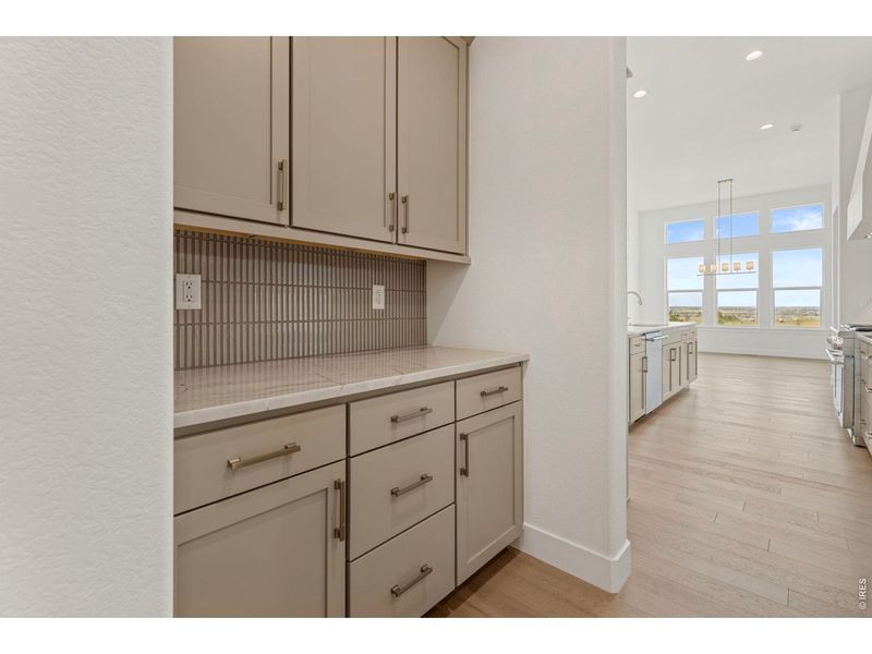Furnished interior view inside a new home in RainDance, Windsor (Image 17).