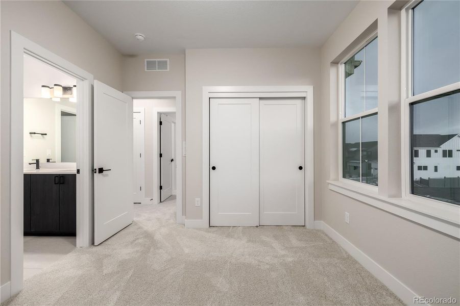 Spacious, unfurnished interior of a new home in West Grange, Longmont (Image 32).