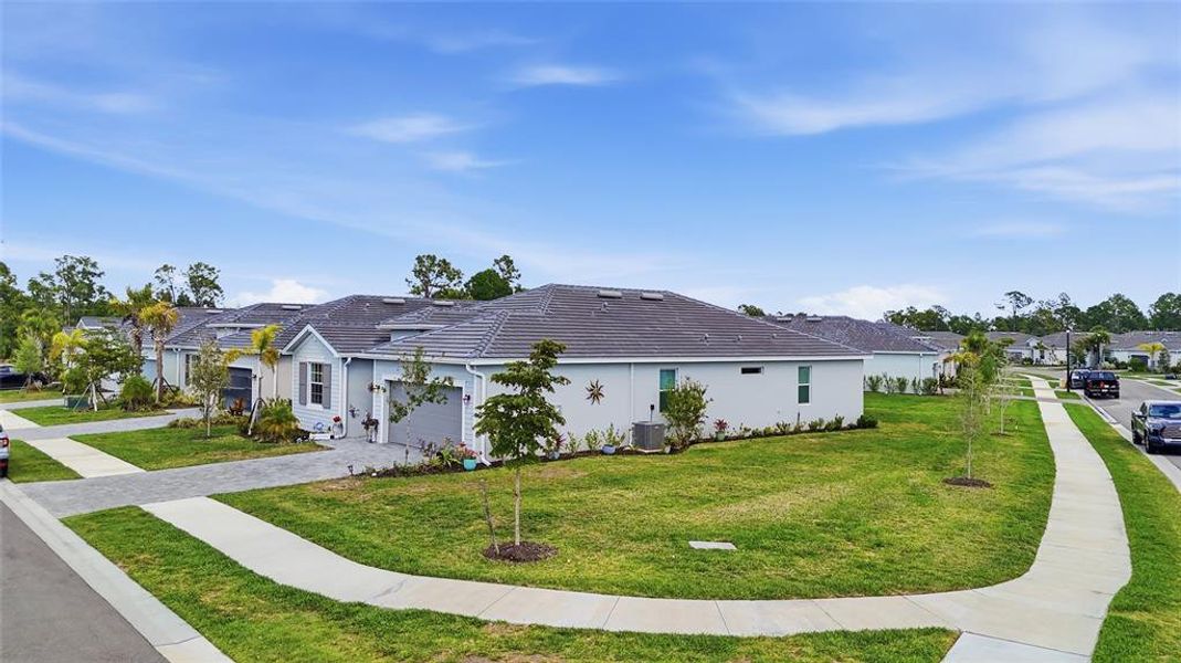 Front exterior of a new home in , Venice, FL, highlighting curb appeal (Image 21). Front exterior of a new home in , Venice, FL, highlighting curb appeal (Image 21).