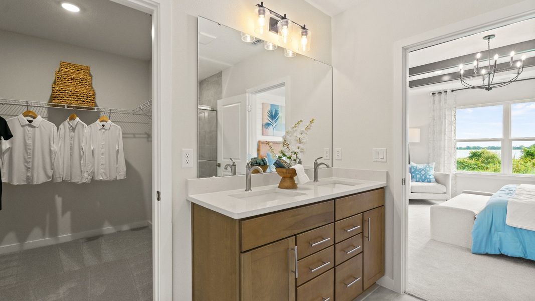 Castaway Model Home Primary Suite, en suite bath with dual sinks new home plan available at Liberty Trace in Haines City, fl
