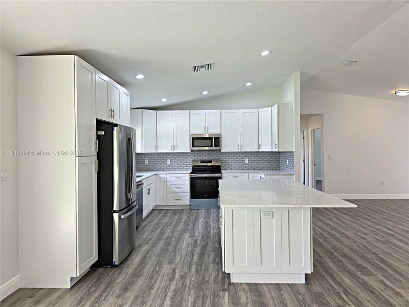 Furnished interior view inside a new home in , Lake Placid (Image 4).
