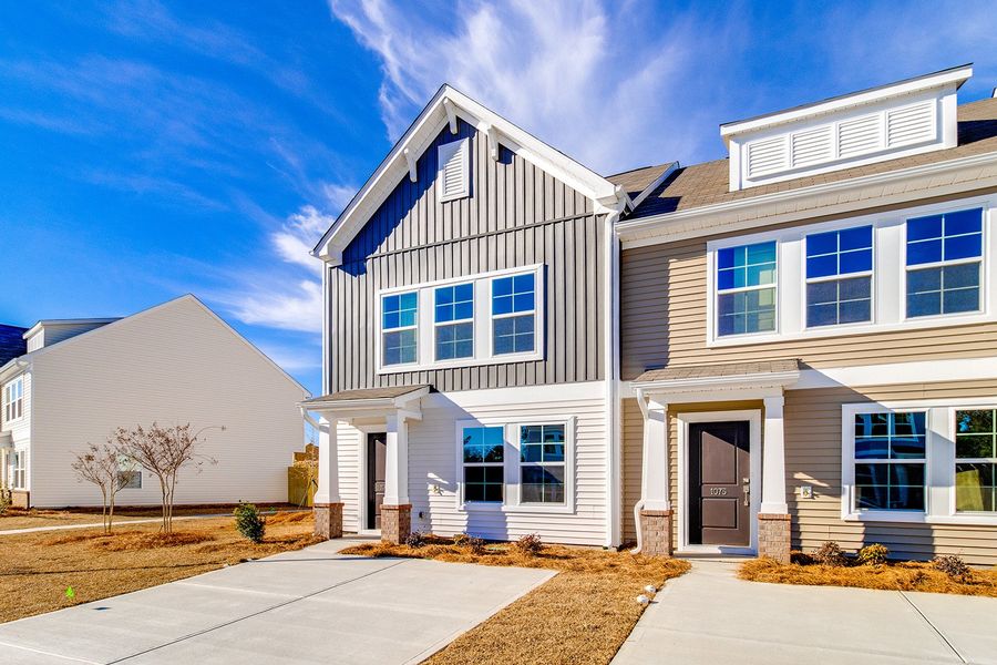 Front exterior of a new home in Astoria, Columbia, SC, highlighting curb appeal (Image 2). Front exterior of a new home in Astoria, Columbia, SC, highlighting curb appeal (Image 2).