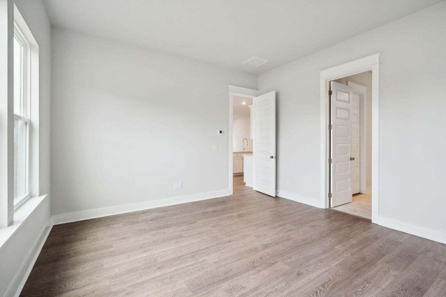 Spacious, unfurnished interior of a new home in Carnes Crossroads: Coastal Collection, Summerville (Image 15). Spacious, unfurnished interior of a new home in Carnes Crossroads: Coastal Collection, Summerville (Image 15).