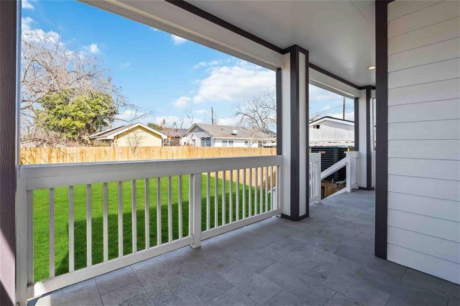 nice patio in gated yard, perfect for gatherings.