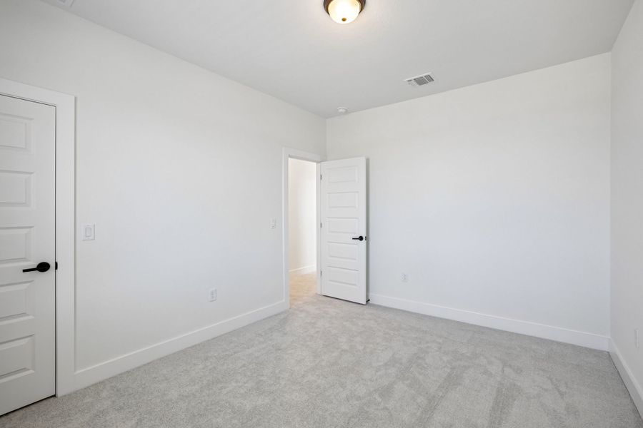 Representative unfurnished interior of a home built from the Denali by Pacesetter Homes in Easton Park, Austin (Image 28).