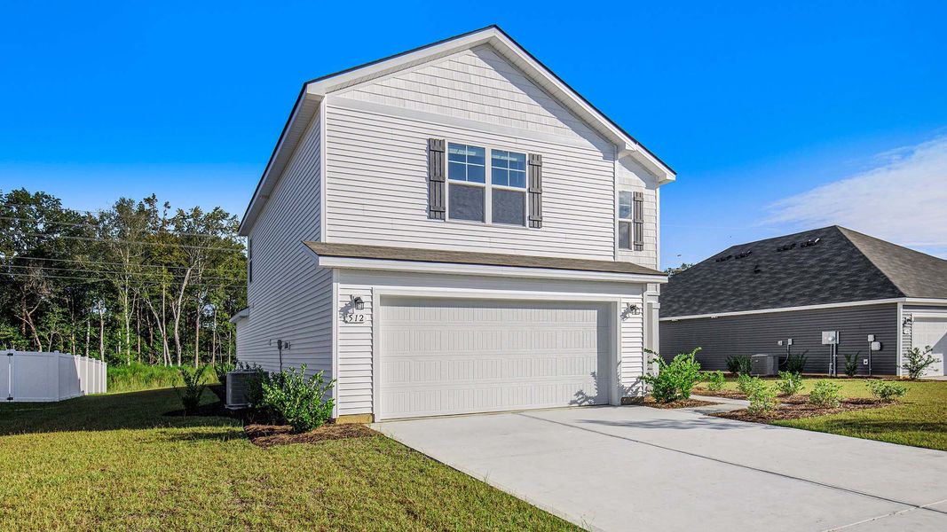 Front exterior of a new home in Ridgefield, Conway, SC, highlighting curb appeal (Image 2).