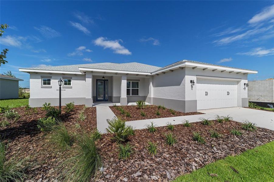 Front exterior of a new home in On Top of the World Communities, Ocala, FL, highlighting curb appeal (Image 19).