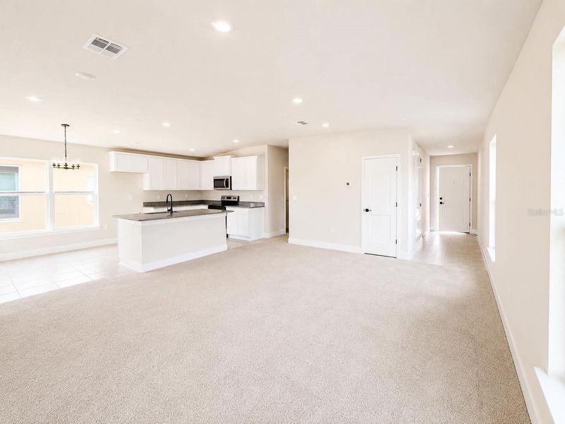 Spacious, unfurnished interior of a new home in Harmony Central, St. Cloud (Image 9).