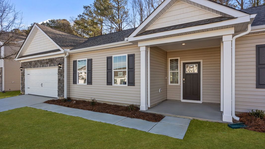 Exterior details and patio area of a home in Tyler - Home on the Lake, New Bern (Image 4).