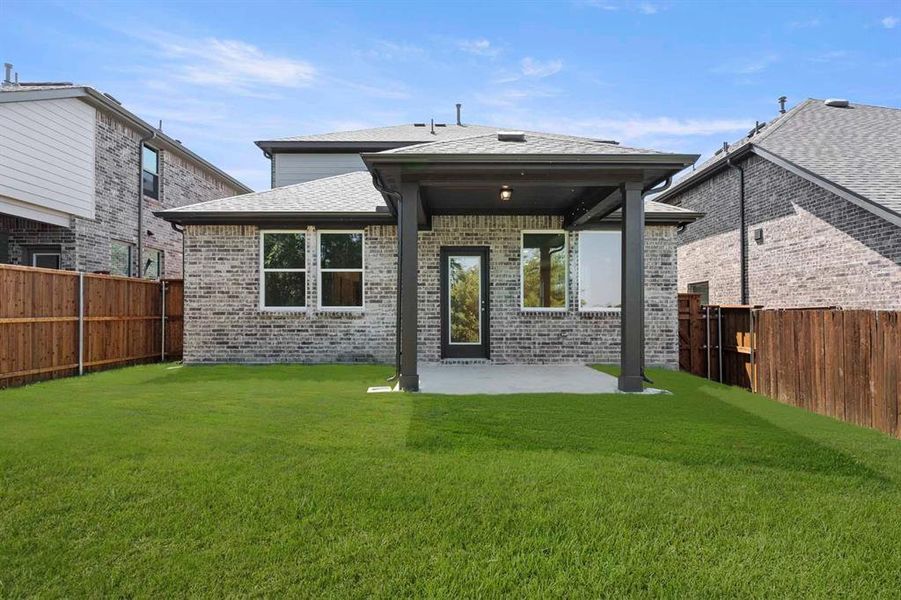 Exterior details and patio area of a home in Devonshire 40s, Forney (Image 21).