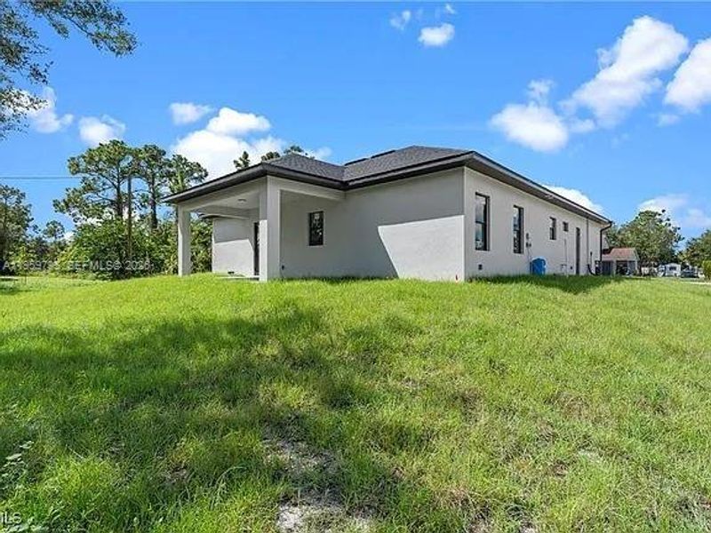 Exterior details and patio area of a home in , Lehigh Acres (Image 23).