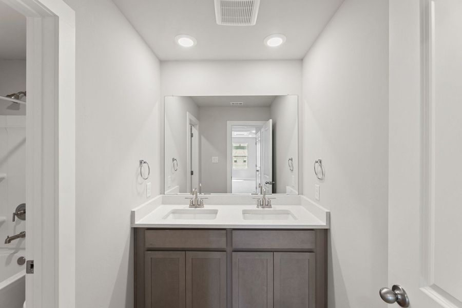 Furnished interior view inside a new home in Highland Ridge, New Braunfels (Image 13).