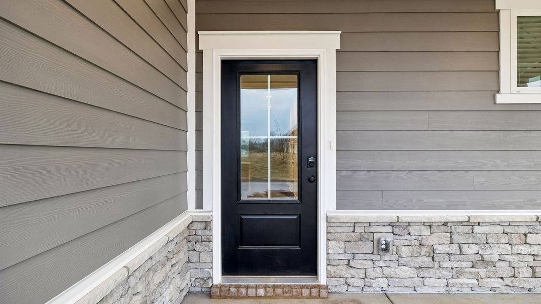 Exterior details and patio area of a home in Reserve at Hickory Ridge, Columbia (Image 3).