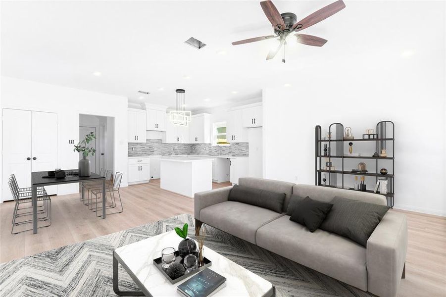 From the living room, take in the inviting layout with the kitchen straight ahead and the dining room to the left, all perfectly connected for easy living. (Photo may be enhanced and may include virtual staging)