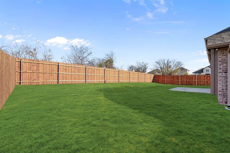 Exterior details and patio area of a home in The Grove, Midlothian (Image 3).