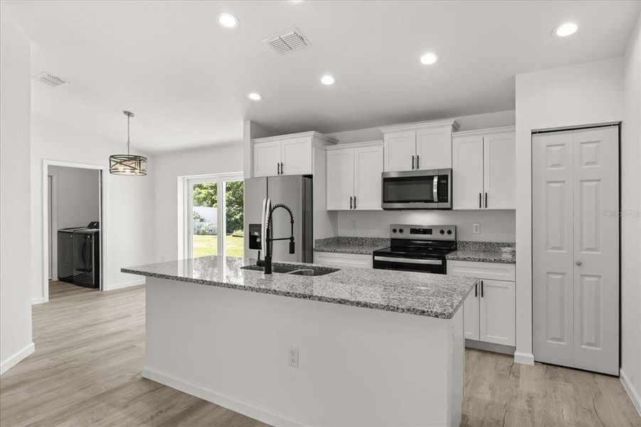 Furnished interior view inside a new home in , Dunnellon (Image 10).