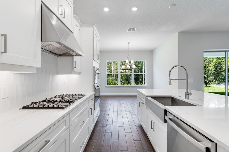 Representative furnished interior of a home built from the Letizia by Taylor Morrison in Esplanade at Center Lake Ranch, St. Cloud (Image 6).