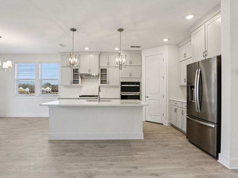 Furnished interior view inside a new home in Station Hill - Reserve Series, Franklin (Image 5).