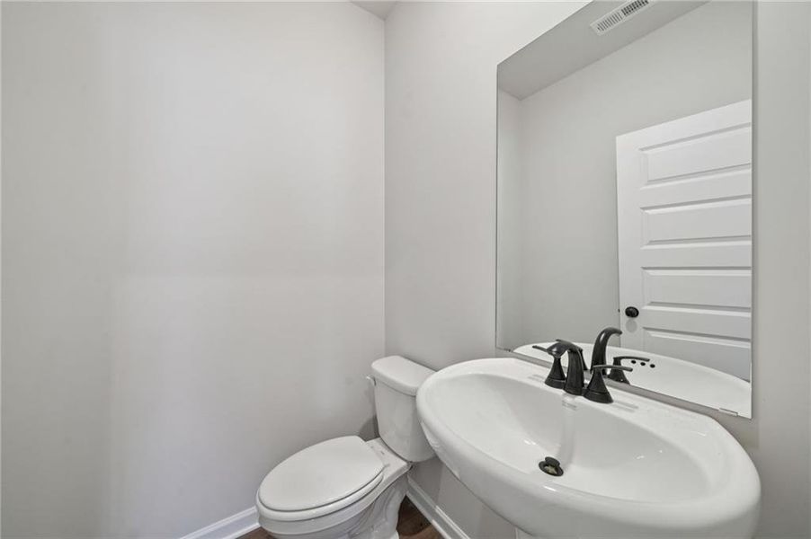 Furnished interior view inside a new home in Vines at Mill Creek - Estate Series, Braselton (Image 7).