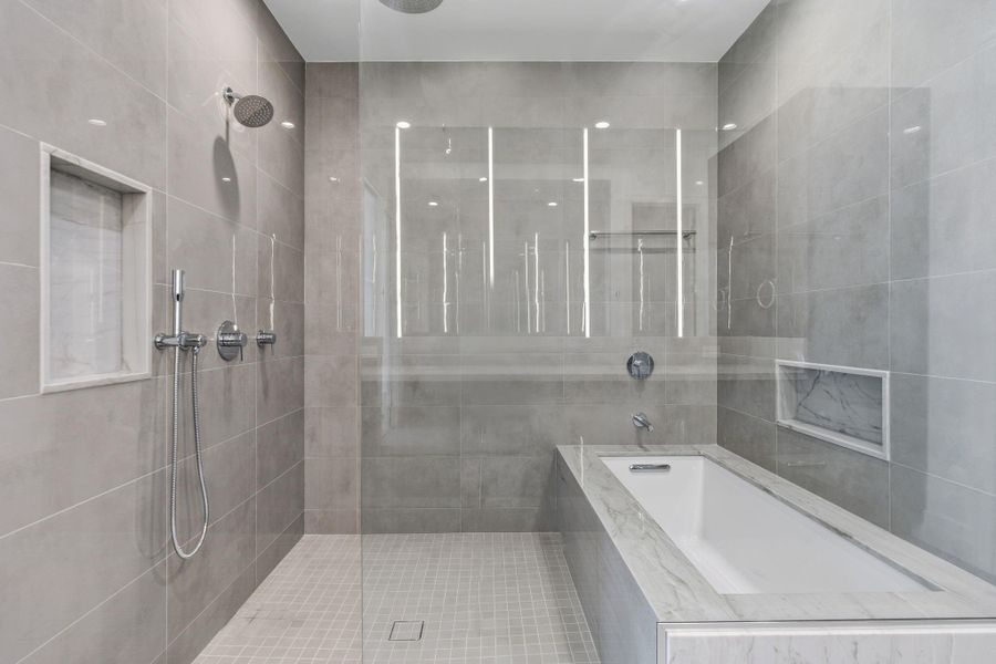 Grohe German fixtures including rain shower, handheld, and single hole faucets.