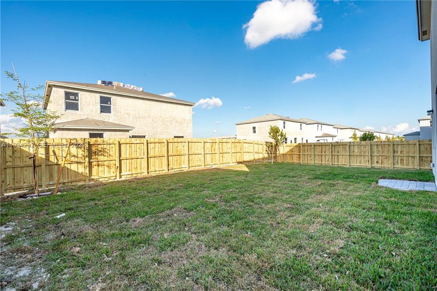 Exterior details and patio area of a home in Acacia Groves, Miami (Image 4).