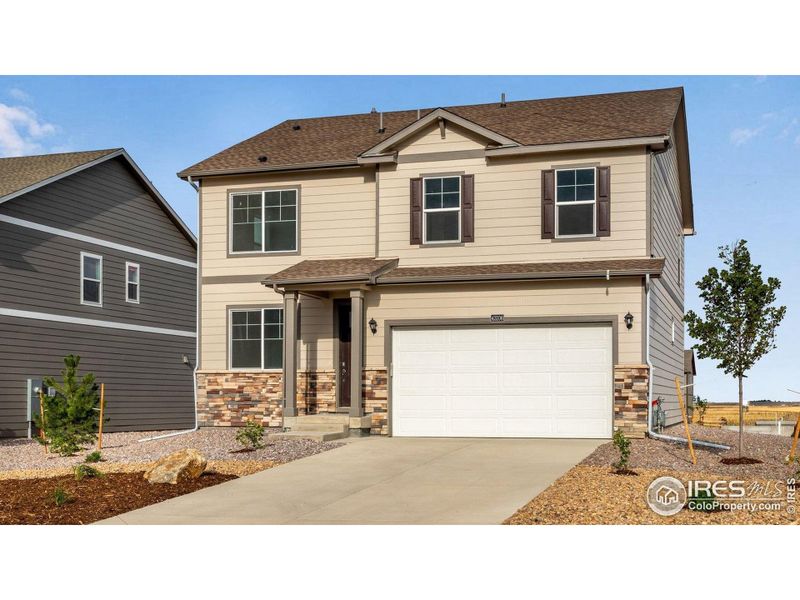 Front exterior of a new home in Westgate, Greeley, CO, highlighting curb appeal (Image 2). Front exterior of a new home in Westgate, Greeley, CO, highlighting curb appeal (Image 2).