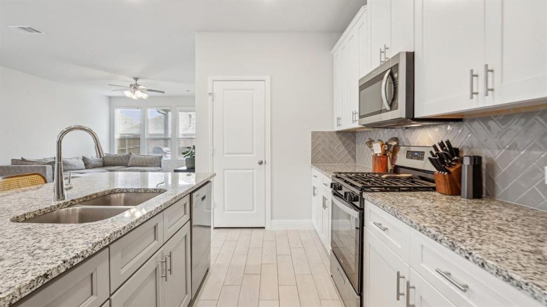 Furnished interior view inside a new home in Venetian, Weston (Image 9).
