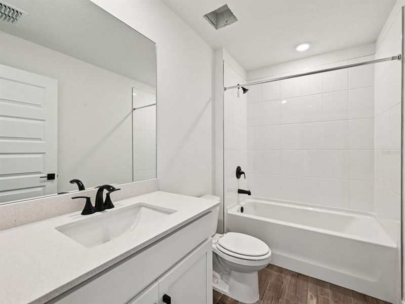 Furnished interior view inside a new home in Oakfield Trails - Premier Series, Parrish (Image 12).