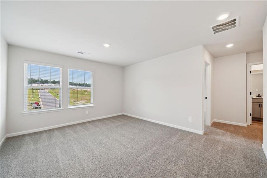 Spacious, unfurnished interior of a new home in Vines at Mill Creek - Estate Series, Braselton (Image 24).