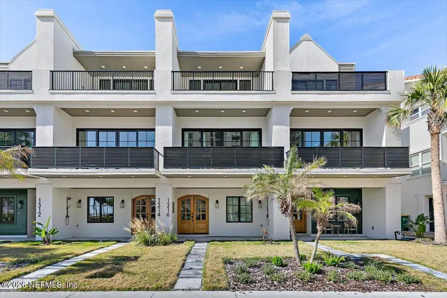 Front exterior of a new home in , Jacksonville Beach, FL, highlighting curb appeal (Image 1). Front exterior of a new home in , Jacksonville Beach, FL, highlighting curb appeal (Image 1).