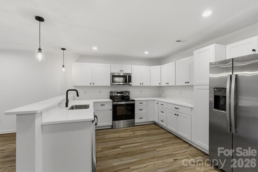 Furnished interior view inside a new home in , Hickory (Image 4).