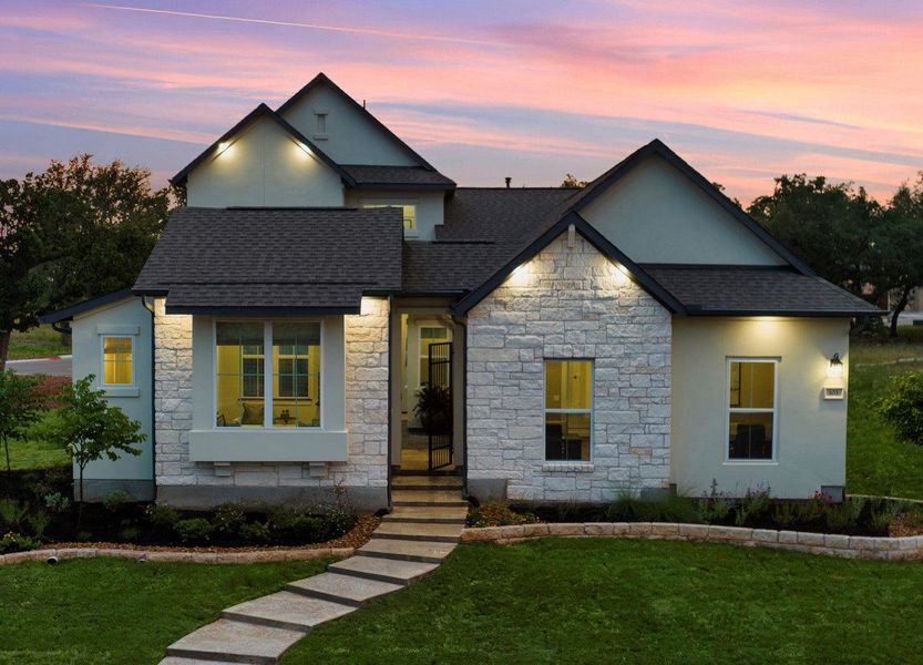 Front exterior of a new home in Parmer Ranch Cottages, Georgetown, TX, highlighting curb appeal (Image 1). Front exterior of a new home in Parmer Ranch Cottages, Georgetown, TX, highlighting curb appeal (Image 1).
