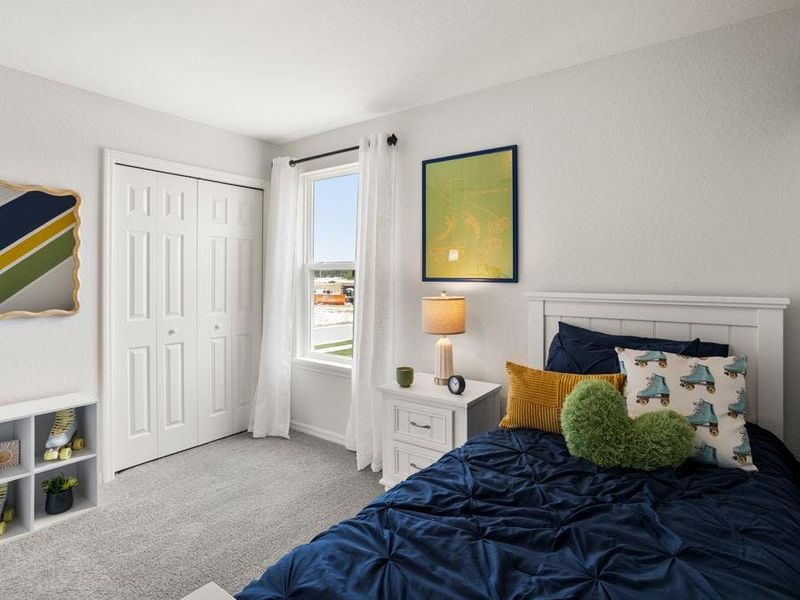 Secondary bedrooms provide space for everyone in your household - Catalina townhome by Highland Homes Secondary bedrooms provide space for everyone in your household - Catalina townhome by Highland Homes