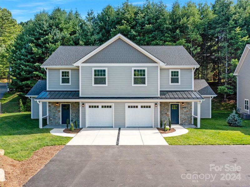 Front exterior of a new home in , Burnsville, NC, highlighting curb appeal (Image 15). Front exterior of a new home in , Burnsville, NC, highlighting curb appeal (Image 15).