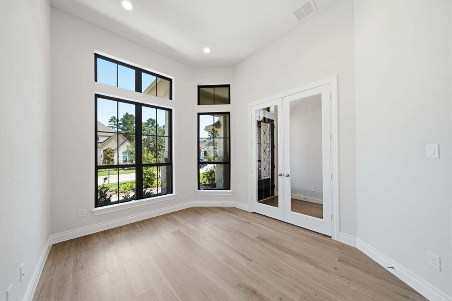 Spacious, unfurnished interior of a new home in The Woodlands Hills 65′, Willis (Image 21).