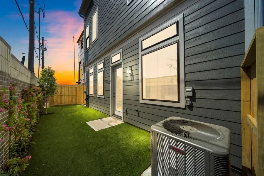 Exterior details and patio area of a home in Spring Valley Creek, Houston (Image 3).
