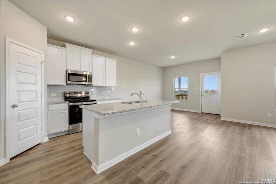 Furnished interior view inside a new home in Paloma Park, Converse (Image 7).