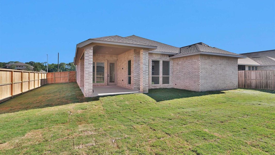 Exterior details and patio area of a home in , Manvel (Image 3).