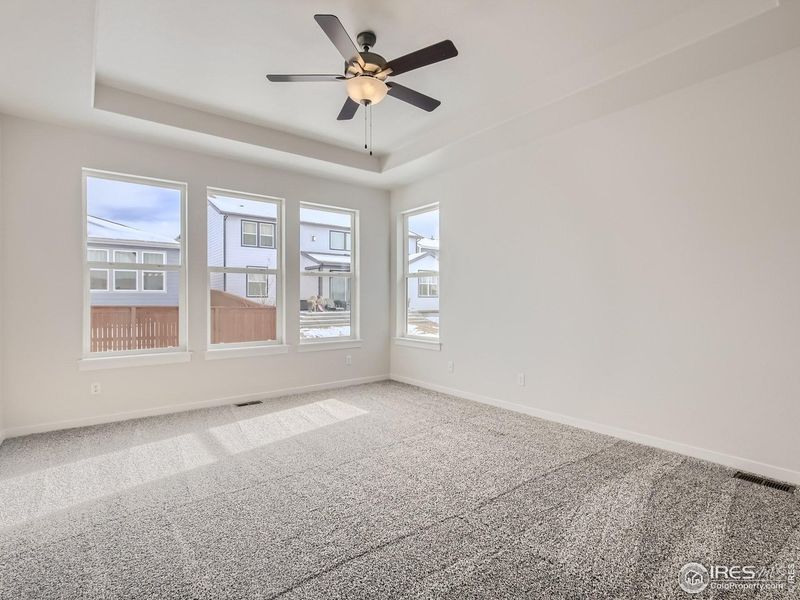 Spacious, unfurnished interior of a new home in RainDance, Windsor (Image 20).