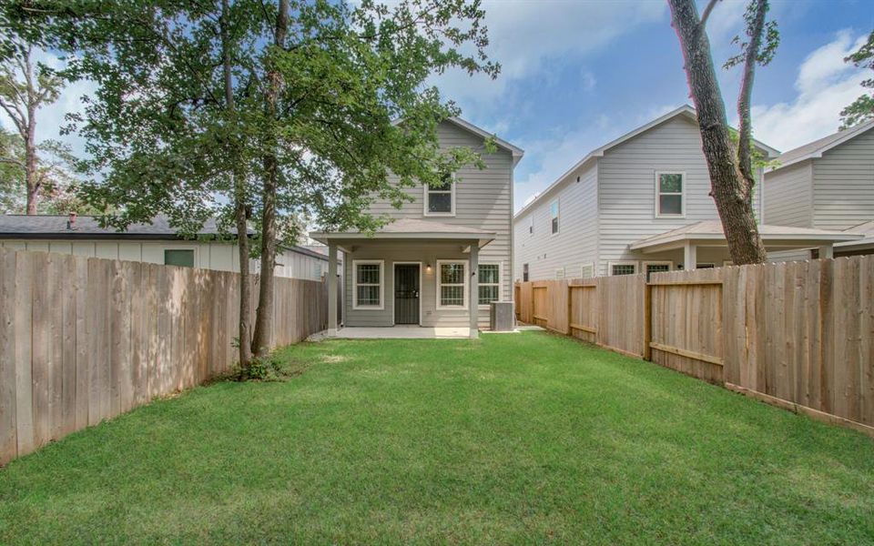 Amazing private backyard with covered patio! (photo from neighboring home)